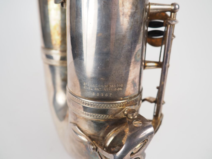 SELMER. Saxophone en métal argenté. Signé. Dans son coffret.