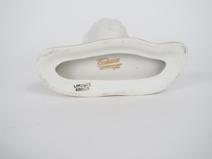 THARAUD à Limoges. Sujet en biscuit, "buste de jeune garçon". Signé. H