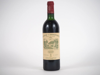 Vente aux enchères 1 BOUTEILLE CHÂTEAU CARBONNIEUX GCC GRAVES - 1985 - HEP