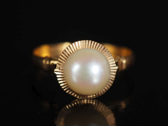 Vente aux enchères Bague 1900 en or 750 et perle Poids tel : 2,05 g   