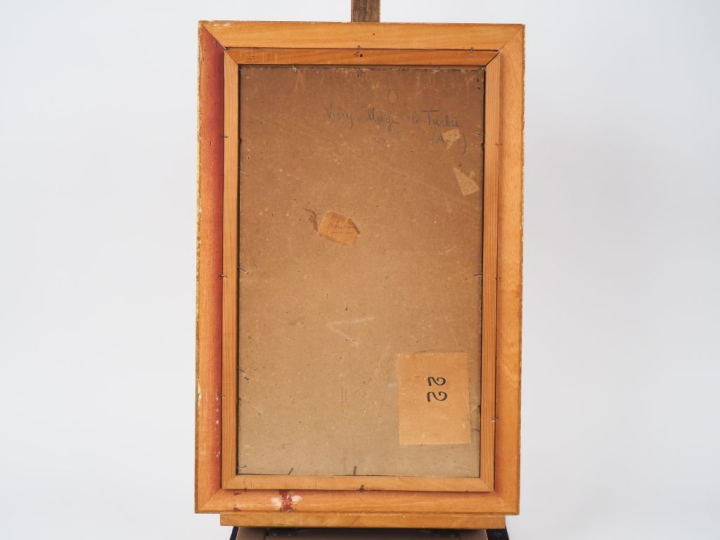 Ecole française XXème. "Village de la Turbie". Huile sur carton, titré