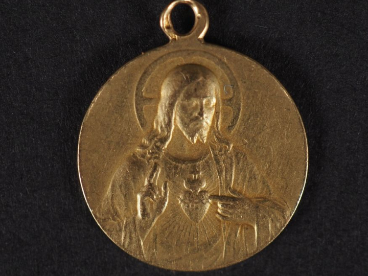 Médaille religieuse double faces en or jaune 750, figurant le Christ a