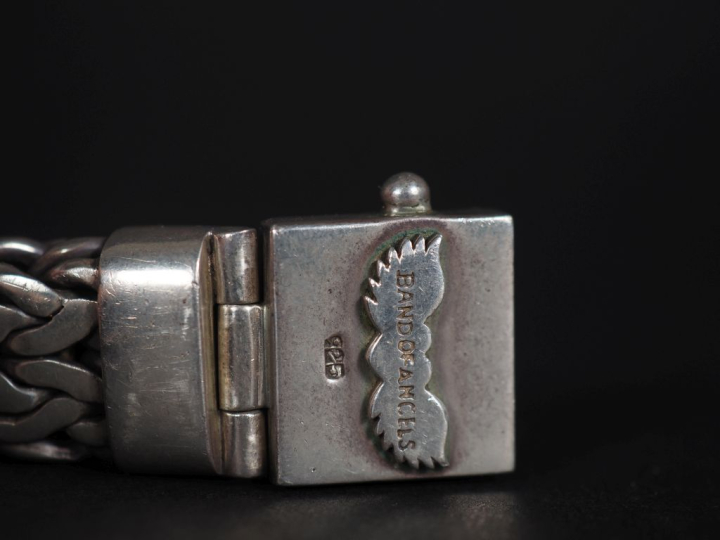 Important bracelet gourmette maille tressée en argent  signé Band of a