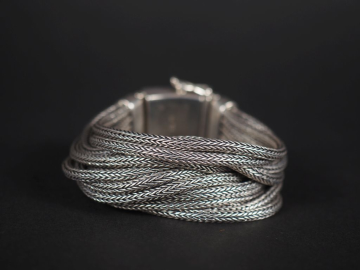 Bracelet en argent, à 14 rangs de maille tressée  signé Band of Angels