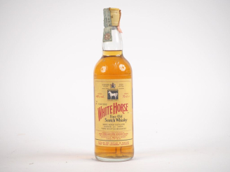 Vente aux enchères WHITE HORSE SCOTCH WHISKY 70 cl - 40 % - ÉTIQUETTE AU DOS ABIMÉE 