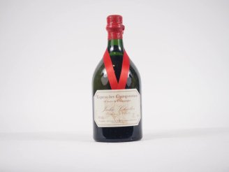 Vente aux enchères 1 BOUTEILLE LIQUEUR DES CHAMPENOISES AU MARC DE CHAMPAGNE JACKIE CHARL