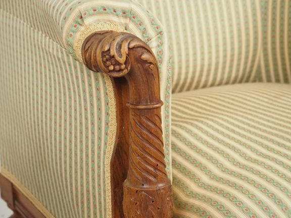 Paire de fauteuils 1900, montants d'accotoirs et pieds à côtes torse. 