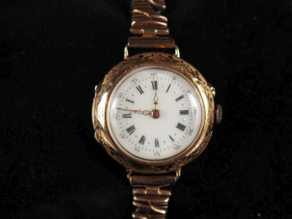 Vente aux enchères Montre de col Napoléon III en or 750, transformée en montre bracelet. 