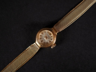 Vente aux enchères ERMO Montre bracelet de dame, boitier et bracelet en or jaune 750.  Ca