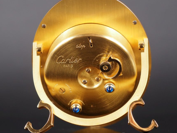 CARTIER, Paris Pendulette baignoire ou réveil de table en métal doré e