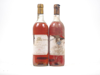 Vente aux enchères 2 BOUTEILLES DE SAUTERNES : 1 CHÂTEAU DU GRAND CARRETEY - 1985 - MEP/E