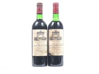 Vente aux enchères 2 BOUTEILLES CHÂTEAU LÉOVILLE LAS CASES GCC ST JULIEN - 1979 - 1 BG/1 