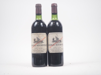 Vente aux enchères 2 BOUTEILLES CHÂTEAU BEYCHEVELLE GCC ST JULIEN - 1983 - 1 BG/1 LB/ELS 