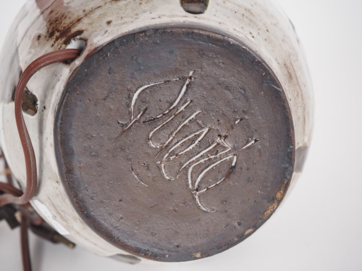 Paul QUERE. Vase en céramique polychrome à décor géométrique, monté en