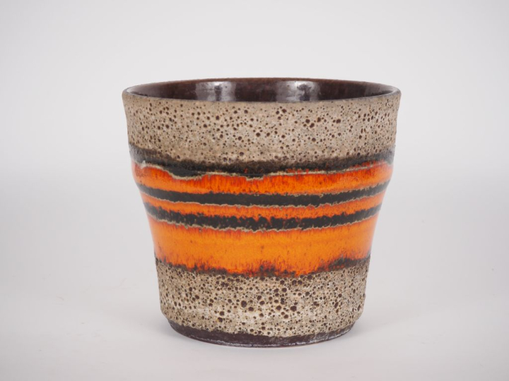 VALLAURIS (?). Cache-pot en céramique à décor flammé polychrome. Dim. 