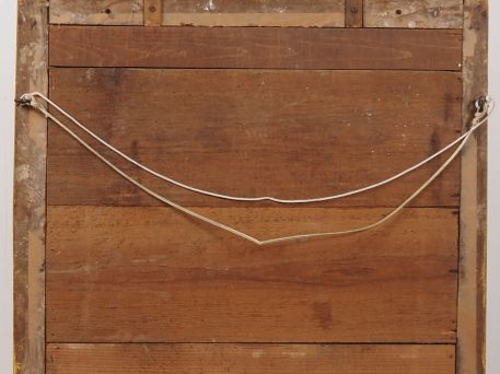 Miroir Napoléon III de style Empire, en bois et stuc doré, à décor de 