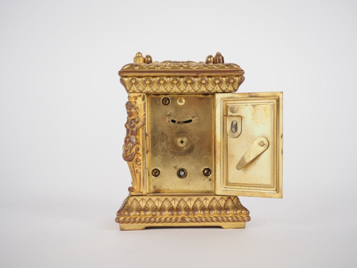 Pendulette de voyage fin XIXème - début XXème de style Louis XIV en br