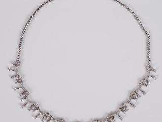Vente aux enchères Collier draperie en argent, serti de pierres à l’imitation du diamant.