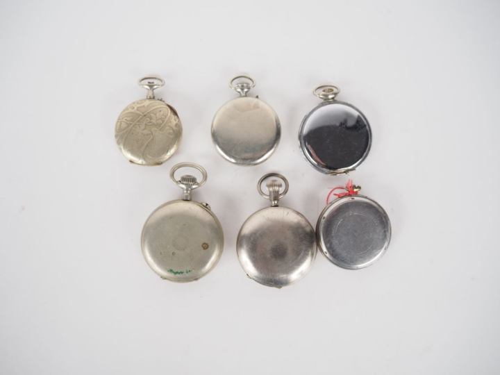 Ensemble comprenant :  - W. ROROSSKOPF   Cie Montre de gousset en méta