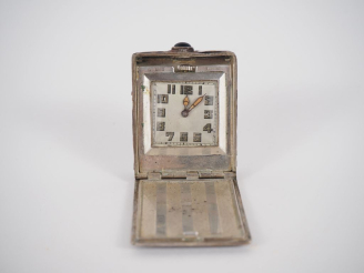 Vente aux enchères MARLYS WATCH   Co  Montre de poche en argent 935 gainée de cuir.  Cadr