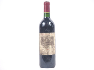 Vente aux enchères 1 BOUTEILLE CARRUADES DE LAFITE PAUILLAC - 2000 - ETS/CAPS LÉGER ABIMÉ