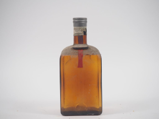 Vente aux enchères 1 VIEUX FLACON COINTREAU - CAPS ÉTAIN