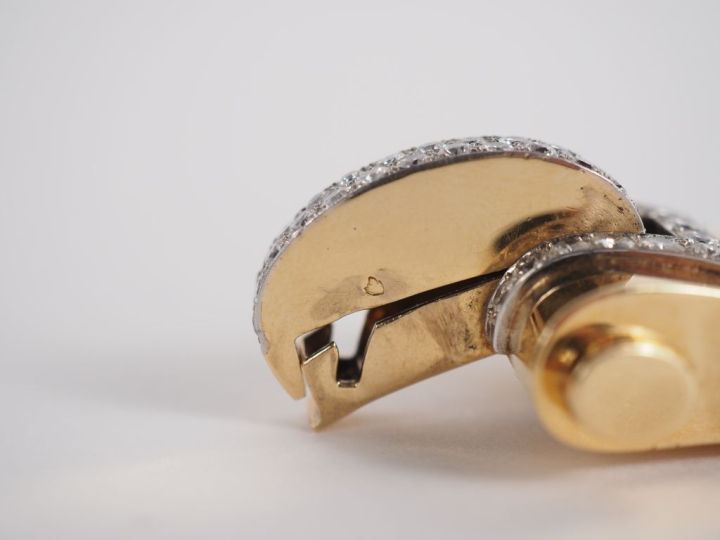 BOUCHERON, Paris Bracelet tank en platine et or jaune 750, composé d'u