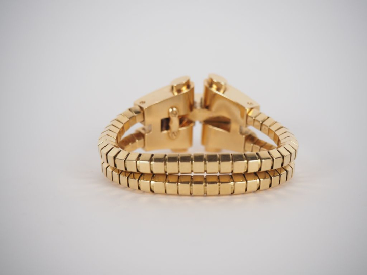 BOUCHERON, Paris Bracelet tank en platine et or jaune 750, composé d'u