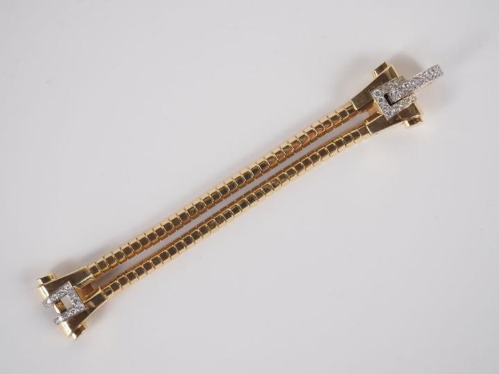 BOUCHERON, Paris Bracelet tank en platine et or jaune 750, composé d'u