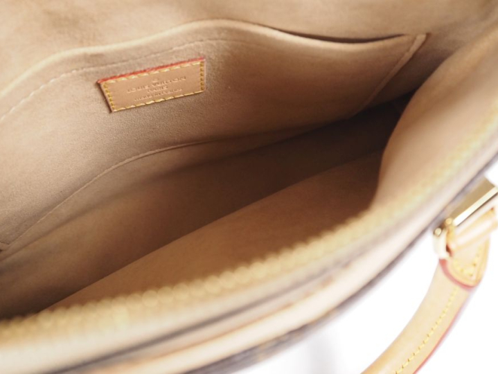 Louis VUITTON, Paris Sac en toile monogrammée en cuir, modèle Pallas. 