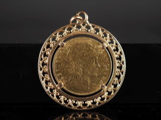 Vente aux enchères Pendentif en or jaune 750, serti en son centre d'une pièce de 10 Franc