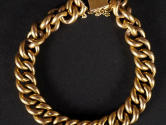 Vente aux enchères Bracelet souple en or jaune 750, maille gourmette. Chainette de sécuri