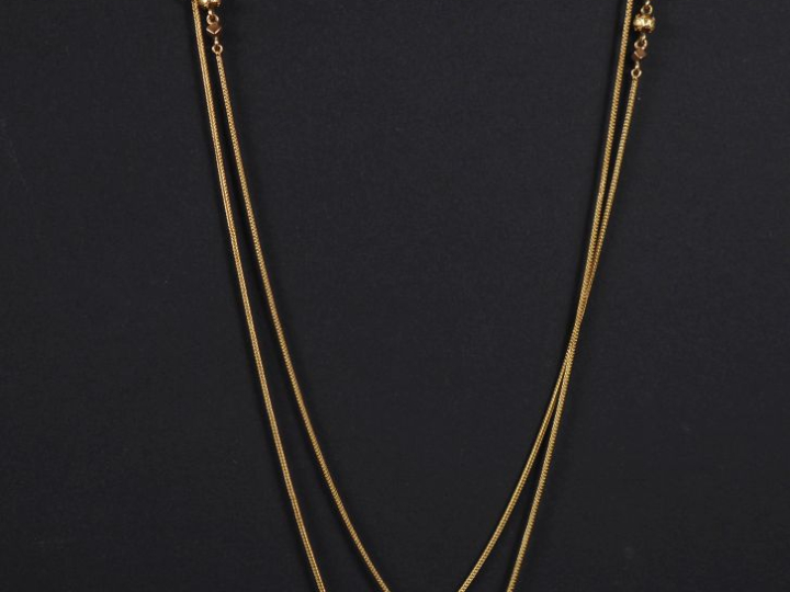 Sautoir ou élément de giletière en or jaune 750, maille ronde tressée,