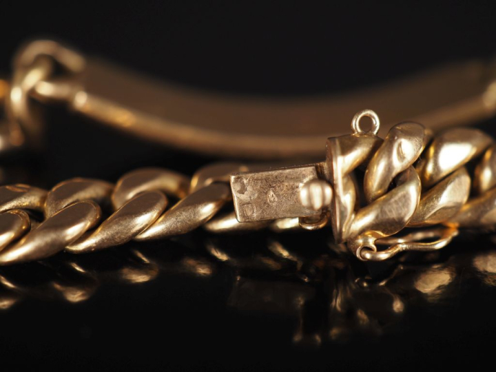 Bracelet gourmette en or jaune 750, marquée "Jean". Long. 21 cm Poids.