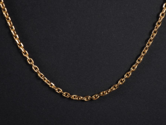 Vente aux enchères Chaine en or jaune 750, maille forçat.  Long. 68,5 cm Poids. 17,69 g
