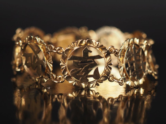 Vente aux enchères Bracelet souple en or jaune 585, composé de maillons ronds ajourés, à 