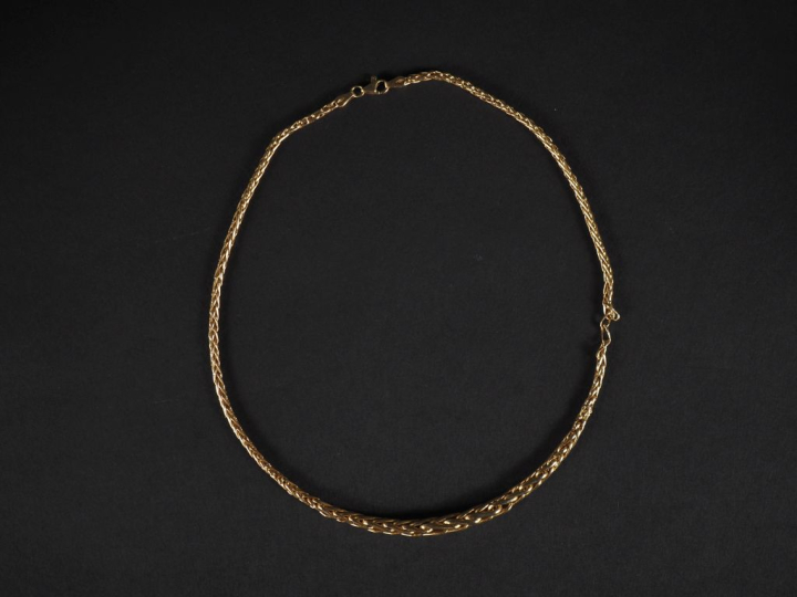 Collier souple en or jaune 750, maille palmier en chute.  Long. 40,5 c