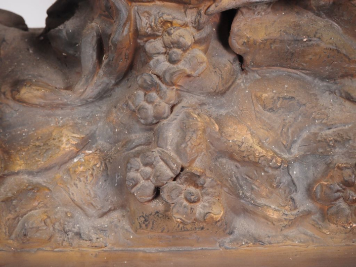 GOLDSCHEIDER.  Grande jardinière en stuc patiné figurant deux enfants 