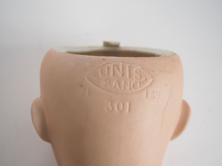 Lot de deux poupées de fabrication française avec tête porcelaine comp