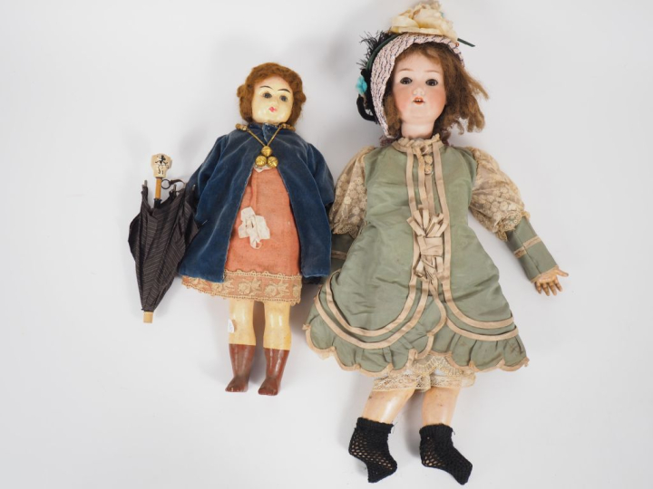 Lot de 2 poupées anciennes comprenant. une entièrement en composition 