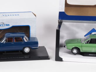 Vente aux enchères Model Cars. Deux miniatures  au 1/18 en boîte d'origine Bel état.