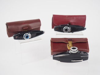 Vente aux enchères STYLOPHOT. Lot de trois appareils photographiques miniatures dans leur