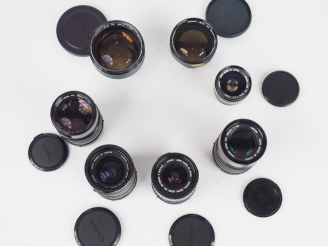 Vente aux enchères CANON. Lot de sept objectifs : - EX 1:3.5/95 n°26292 - FD 1:2.8/135 n°