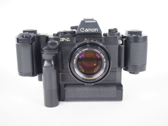 Vente aux enchères CANON F-1. Appareil photographique n°210705 avec objectif CANON FD ASP