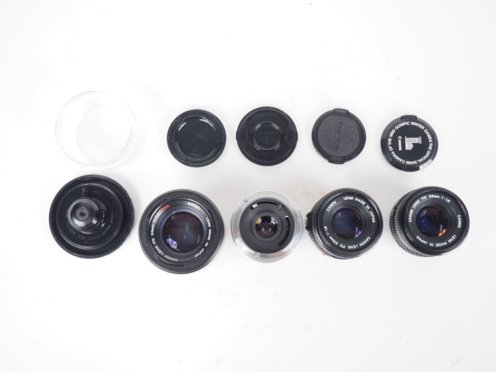 CANON. Lot de quatre objectifs : - FD 1:1.8/50 n°1893107 - FD 1:1.8/50