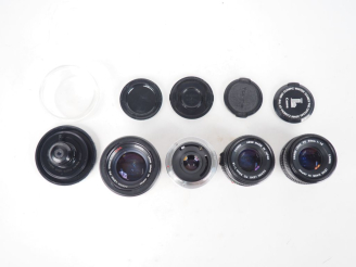 Vente aux enchères CANON. Lot de quatre objectifs : - FD 1:1.8/50 n°1893107 - FD 1:1.8/50