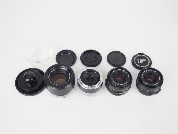 CANON. Lot de quatre objectifs : - FD 1:1.8/50 n°1893107 - FD 1:1.8/50