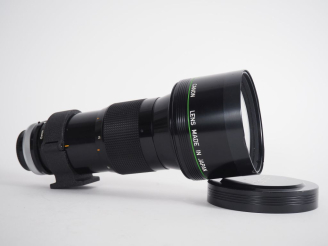 Vente aux enchères CANON. Téléobjectif FD 1:2.8/300 FLUORITE n°10610 avec bouchon.
