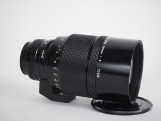 Vente aux enchères CANON. Téléobjectif REFLEX 1:8/500 n°20939 avec bouchon.