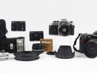 Vente aux enchères NIKON. Lot deux appareils photographiques : - NIKON FG n°8224790 avec 